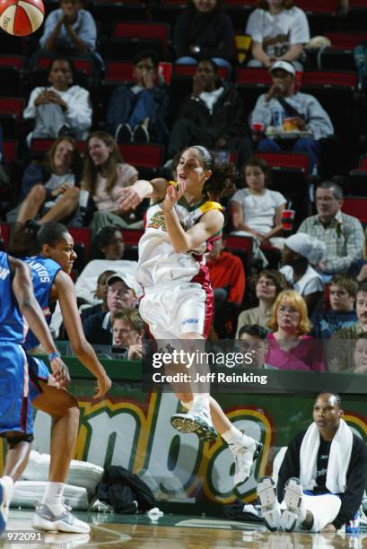 Sue Bird of the Seattle Storm throws the ball inbounds during the game against the Orlando Miracle on June 27, 2002 at Key Arena in Seattle,...