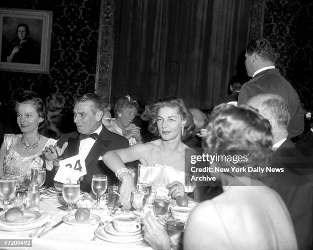 Actress Lauren Bacall has snack at the restaurant in the Met during intermission. Jason Robards, Jr., whom she is expected to marry, did not attend.