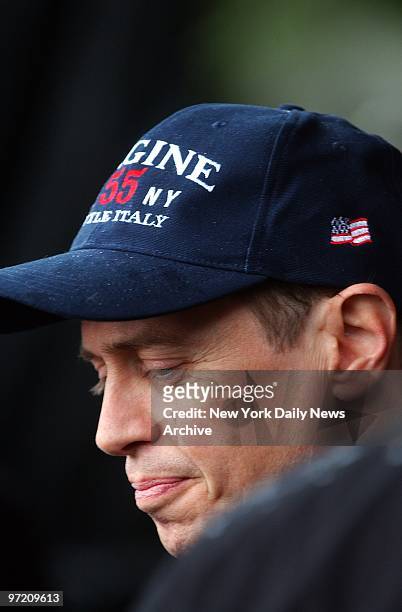 Actor Steve Buscemi presides over ceremonies during the Uniformed Firefighters Association rally on a rainy afternoon in Central Park. Thousands of...