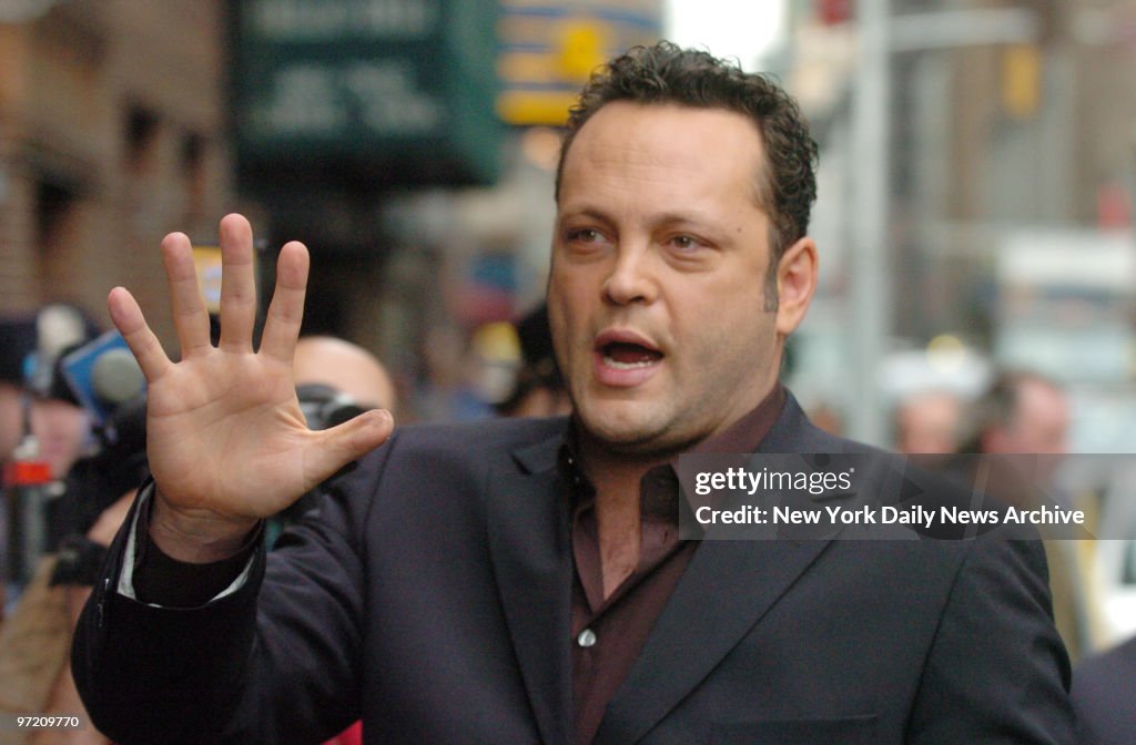 Actor Vince Vaughn walks toward the stage door entrance at t