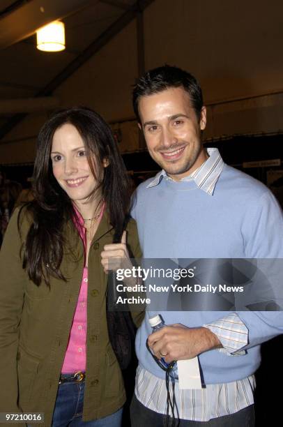 Actors Mary Louise Parker and Freddie Prinze Jr. Are on hand backstage at the Tent in Bryant Park during a Fashion Week runway show featuring the...