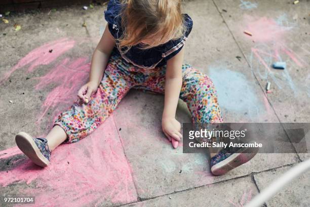 Child playing with chalk