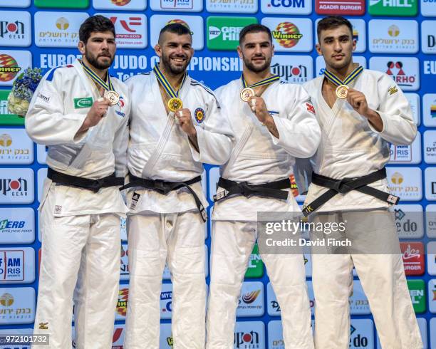 Under 100kg medallists L-R: Silver; Cyrille Maret , Gold; Toma Nikiforov , Bronzes; Peter Paltchik and Zelym Kotsoiev during day three of the 2018...