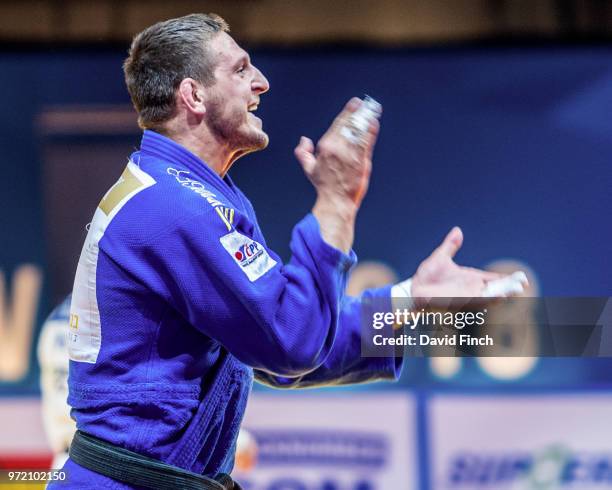 Rio Olympic champion, Lukas Krpalek of the Czech Republic holds Tamerlan Bashaev of Russia for ippon to win the o100kg gold medal, adding it to his...