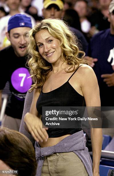 Actress Sarah Jessica Parker attends game 2 of the subway series double header between the New York Yankees and the New York Mets at Yankee Stadium.