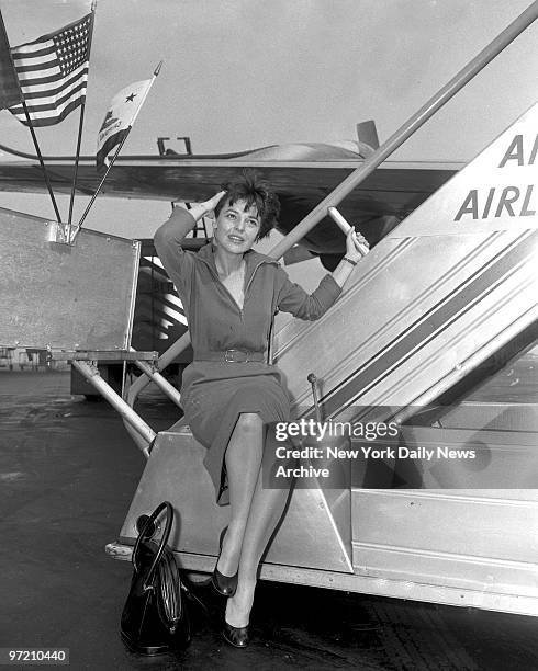 Actress Anne Bancroft at Idlewild Airport leaves for Hollywood, after appearing last night on TV Show "Alcoa Hour" and will audition for the "Helen...