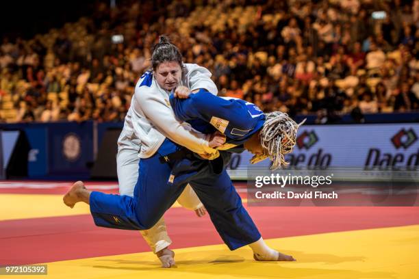 Romane Dicko of France attacks Larisa Ceric of Bosnia and Herzegovina eventually winning the o78kg gold medal by an ippon during day three of the...