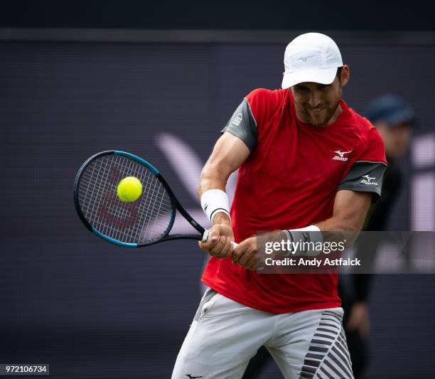 Kevin King of the USA competes in his men's singles match against Bernard Tomic of Australia during day two of the 2018 Libema Open on June 12, 2018...