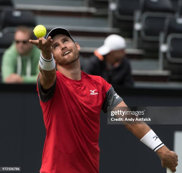 Kevin King of the USA competes in his men's singles match against Bernard Tomic of Australia during day two of the 2018 Libema Open on June 12, 2018...