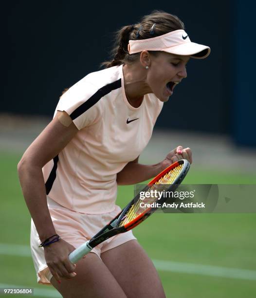 Veronika Kudermetova of Russia celebrates winning a set in her women's singles match against Anett Kontaveit of Estonia during day two of the 2018...