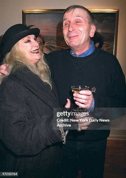 Actress Sylvia Miles and artist Michel Delacroix attending the opening of an exhibition of Delacroix's work at the Lumina Art Gallery.,