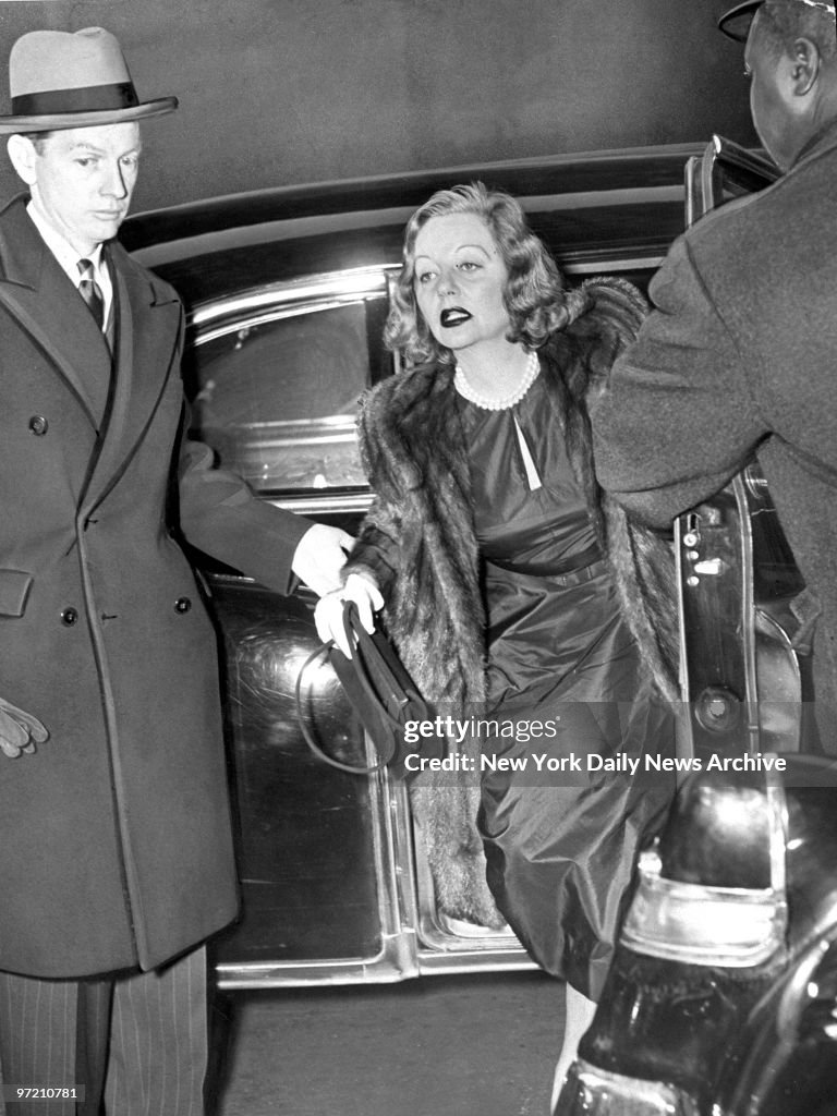 Actress Tallulah Bankhead leaves her car on Leonard St. to g