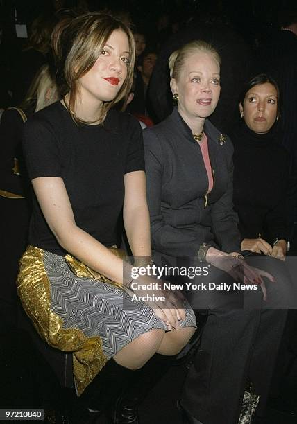 Actress Tori Spelling and her mother take in the styles at the Badgley Mischka fashion show in Bryant Park.