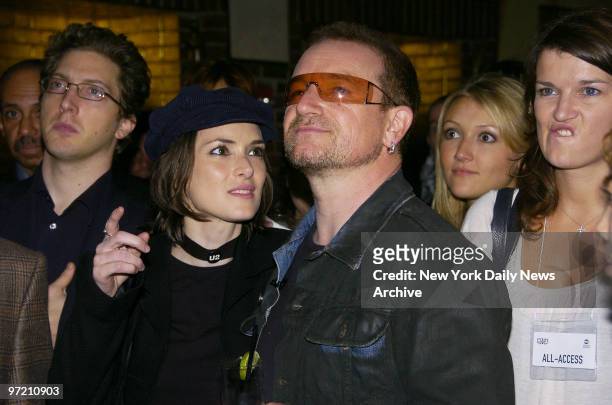Actress Winona Ryder and U2 singer Bono get together during a party at the Hudson Hotel to launch the Campaign To Make Poverty History's new ONE...