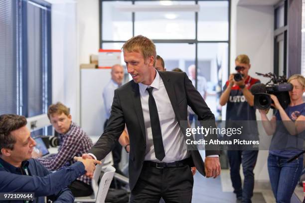 Manager Graham Potter greets reporters during the Swansea City Press Conference at The Fairwood Training Ground on June 12, 2018 in Swansea, Wales.