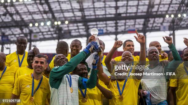 Ahmad Ahmad of CAF lifts the trophy during the FIFA Congress Delegation Football Tournament at CSKA Arena during the on June 12, 2018 in Moscow,...