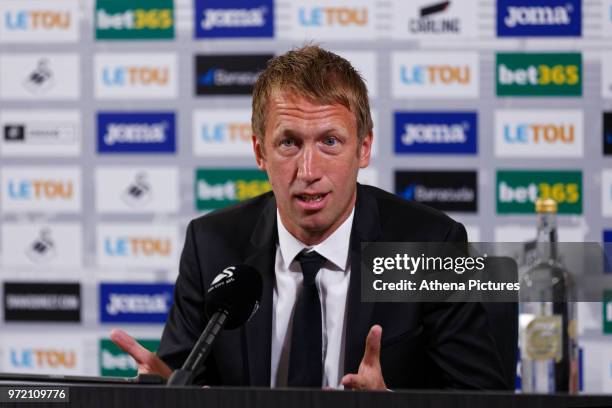 Manager Graham Potter speaks to reporters during the Swansea City Press Conference at The Fairwood Training Ground on June 12, 2018 in Swansea, Wales.