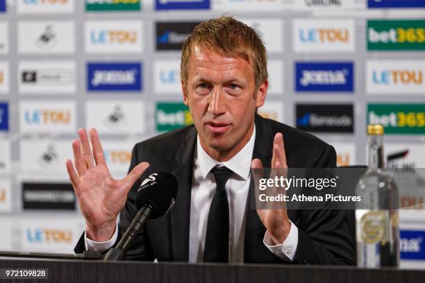 Manager Graham Potter speaks to reporters during the Swansea City Press Conference at The Fairwood Training Ground on June 12, 2018 in Swansea, Wales.