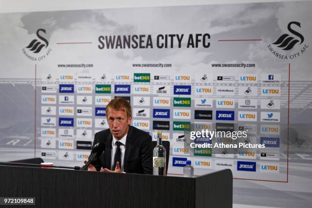 Manager Graham Potter speaks to reporters during the Swansea City Press Conference at The Fairwood Training Ground on June 12, 2018 in Swansea, Wales.