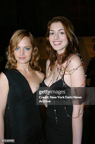 Actresses Mena Suvari and Anne Hathaway get together at the Americans for the Arts' ninth annual National Arts Awards party at Cipriani 42nd St....