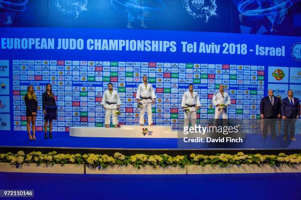 Over 100kg medallists L-R: Silver; Tamerlan Bashaev , Gold; Lukas Krpalek , Bronzes; Stephan Hegyi and Henk Grol . The medals were presented by...