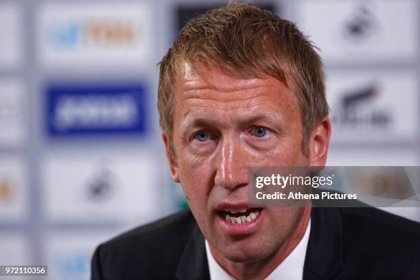 Manager Graham Potter speaks to reporters during the Swansea City Press Conference at The Fairwood Training Ground on June 12, 2018 in Swansea, Wales.