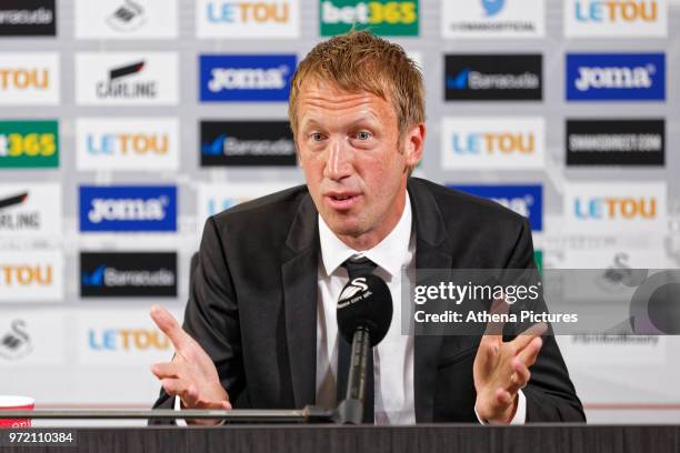 Manager Graham Potter speaks to reporters during the Swansea City Press Conference at The Fairwood Training Ground on June 12, 2018 in Swansea, Wales.