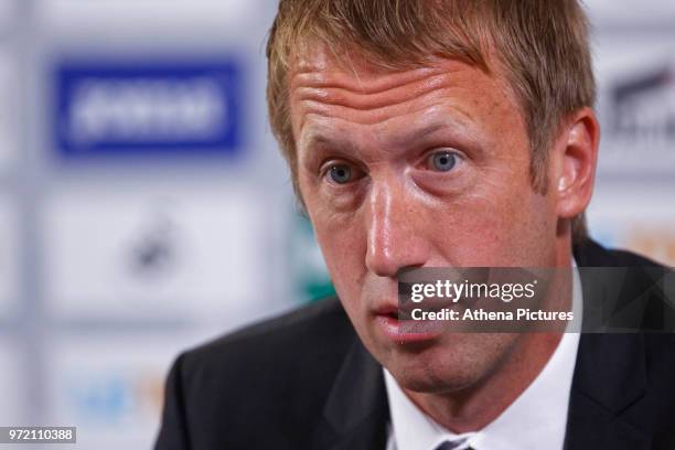 Manager Graham Potter speaks to reporters during the Swansea City Press Conference at The Fairwood Training Ground on June 12, 2018 in Swansea, Wales.