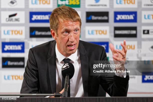 Manager Graham Potter speaks to reporters during the Swansea City Press Conference at The Fairwood Training Ground on June 12, 2018 in Swansea, Wales.