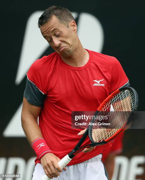 Philipp Kohlschreiber of Germany reacts during his match against Denis Istomin of Uzbekistan during day 2 of the Mercedes Cup at Tennisclub...
