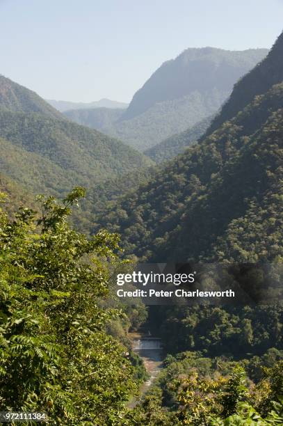 View across forested mountains in the north of Thailand from the road that runs between Mae Hong Son and Mae Sariang.