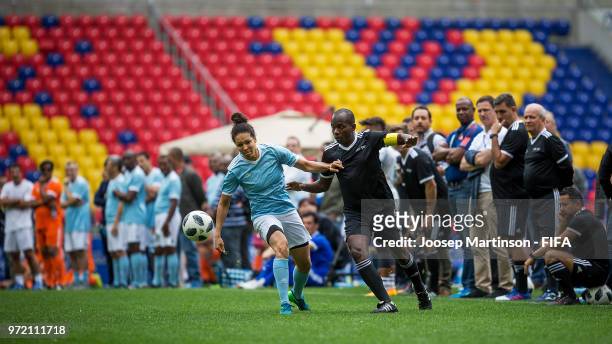 Celia Sasic OFC competes with Carlo Marcelin of CONCACAF during the FIFA Congress Delegation Football Tournament at CSKA Arena during the on June 12,...
