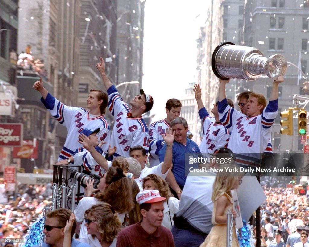 Adam Graves (far left) and Captain Mark Messier (sunglasses)