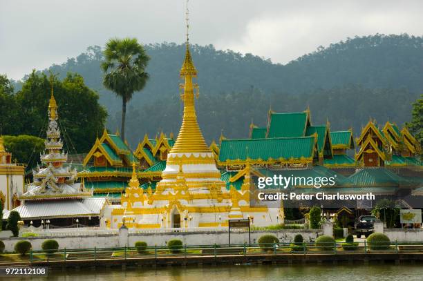 The twin temples by the lake in the centre of Mae Hong Son, Wat Chong Kham has Burmese style temple building and Wat Chong Klang houses the white and...