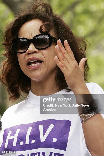 Actress Rosie Perez speaks during a rally outside the United Nations building to mark the 25th anniversary of the AIDS pandemic.