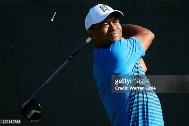 Tiger Woods of the United States plays his shot from the fourth tee during a practice round prior to the 2018 U.S. Open at Shinnecock Hills Golf Club...