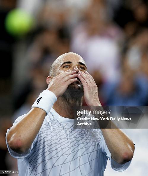 Andre Agassi of the U.S. blows kisses to the crowd after def Andre Agassi of the U.S. blows kisses to the crowd after def