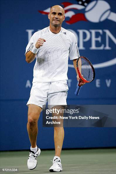 Andre Agassi of the U.S. celebrates after breaking a serve i Andre Agassi of the U.S. celebrates after breaking a serve i
