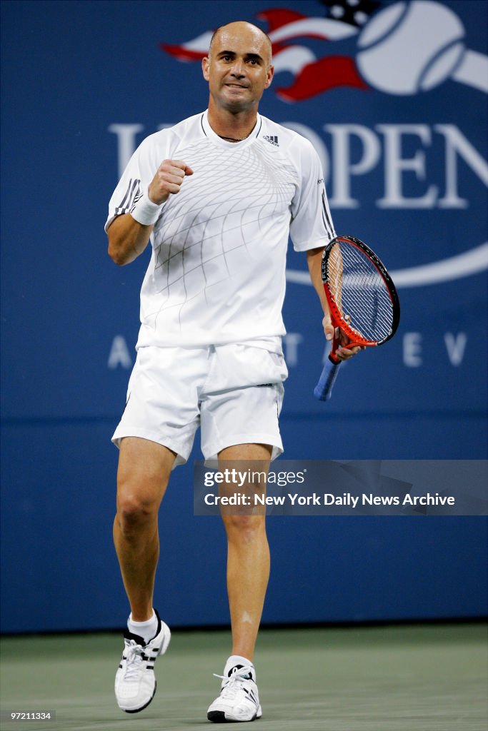 Andre Agassi of the U.S. celebrates after breaking a serve i