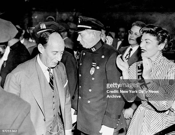 Adlai Stevenson arrives at Madison Square Garden to give a speech to enthusiastic supporters.