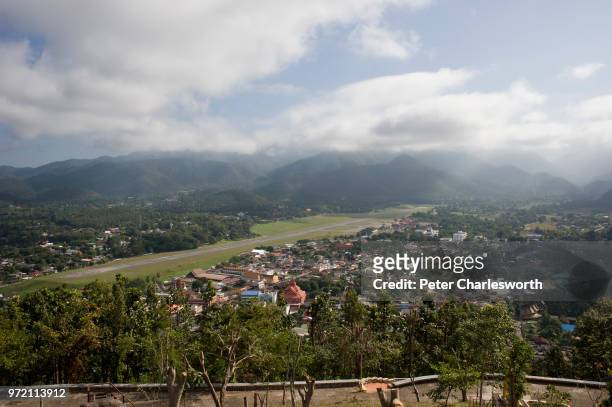 An aerial view of Mae Hong Son and the nearby airport runway from Wat Phra That Doi Kong Mu temple which overlooks the small town from one of the...