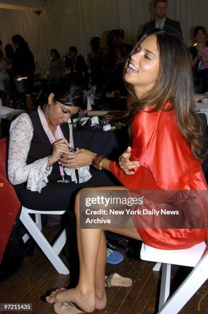 Adriana Lima has her nails done backstage as she prepares for the Victoria's Secret Fashion Show at the Lexington Ave. Armory.