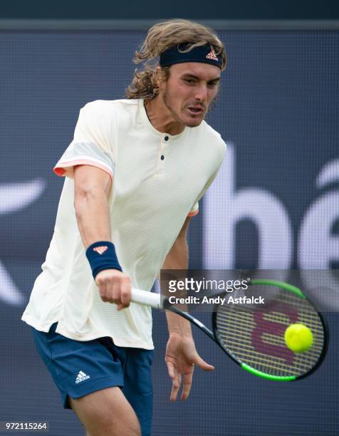 Stefanos Tsitsipas of Greece hits a backhand during the Men's singles, first round match against Bernard Tomic of Australia on day two on Day Two of...