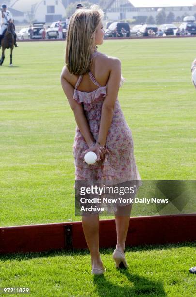 Actress Jessica Alba prepares to throw out the first ball at start of match between the White Birch and the Black Watch during the annual...