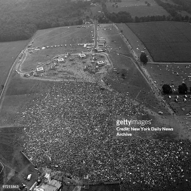 Aerial view of 300,000 people celebrating peace, love and music, better known as the Woodstock Festival.