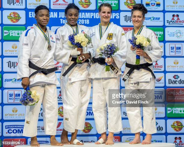 Under 78kg medallists L-R: Silver; Audrey Tcheumeo , Gold; Madeleine Malonga , Bronzes; Anna Maria Wagner and Natalie Powell during day three of the...
