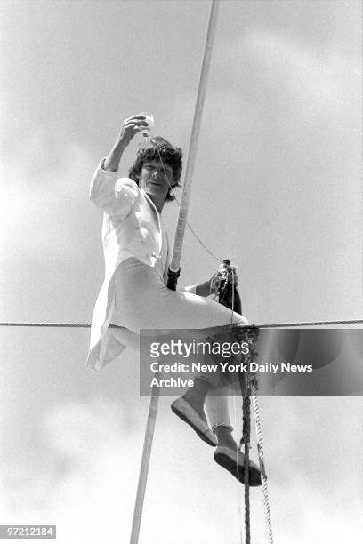 Aerialist Philippe Petit, best known for his unauthorized 1974 walk between the twin towers of the World Trade Center, dazzled a crowd of about 2,500...