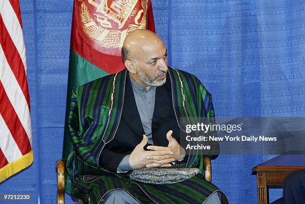 Afghan President Hamid Karzai at a meeting with President George W. Bush at the United Nations today. ,