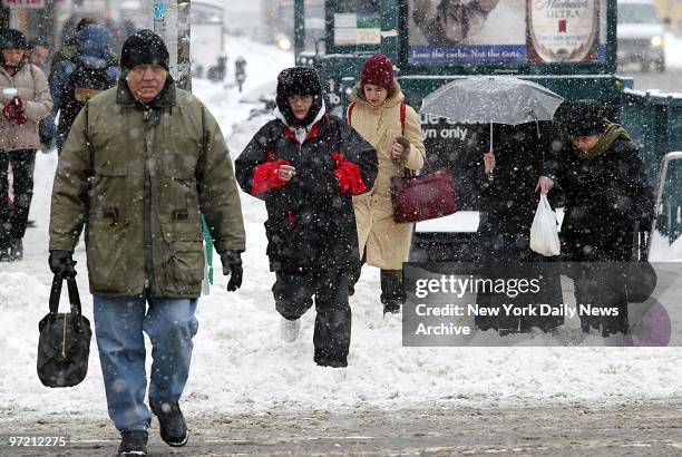 After a smooth crossing in the Staten Island ferry, commuters face a slushy crossing on arrival in Manhattan on the morning after the Blizzard of '03...