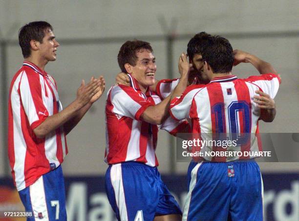 Players of Paraguayan soccer team, Roque Santa Cruz , Carlos Gamarra , Celso Ayala and Roberto Acuna celebrates their first goal during their match...